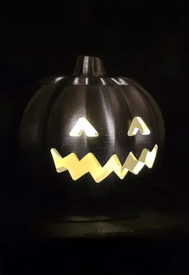 A spooky Halloween pumpkin featuring glowing eyes produced by advanced CNC milling machining at Avonside Engineering