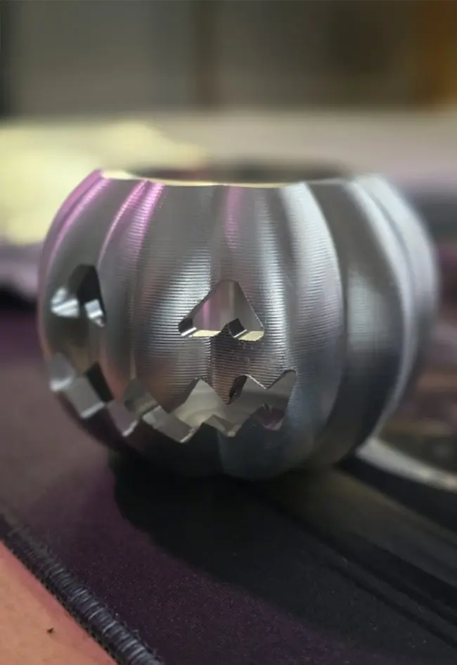 A machined Halloween pumpkin one-off prototype made out of 6082 T6 aluminium using 4th axis milling
